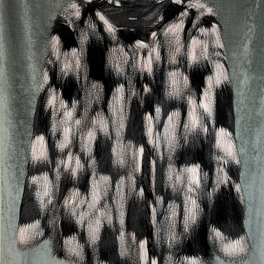 Black and white fur coat.